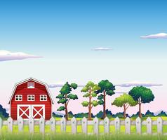 A red barnhouse inside the fence vector