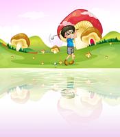 A boy playing golf at the riverbank vector