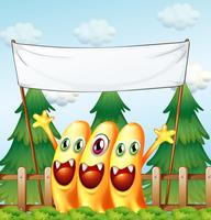 Three monsters under the empty banner vector