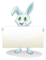 A bunny holding an empty banner  vector