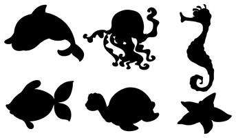 Siluetas de las diferentes criaturas marinas. vector
