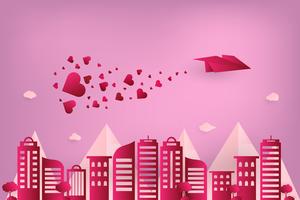 Concepto de amor y día de san valentín. Avión de papel del origami que vuela sobre ciudad urbana con la dispersión del corazón en el cielo. estilo de arte de papel. vector