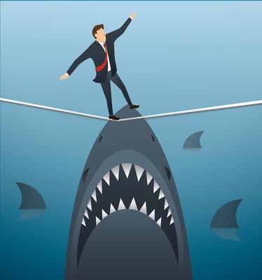 illustration of a businessman walking on rope with sharks underneath business risk chance