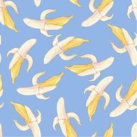 Seamless pattern yellow bananas on a blue background. Vector illustration