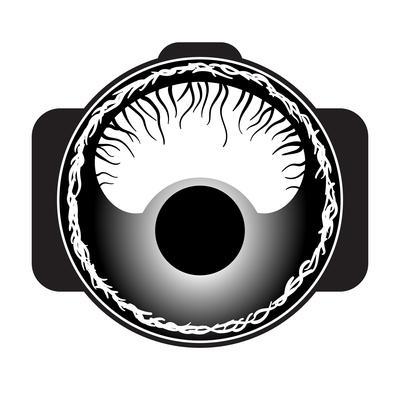 Spider eye on macro lens logo.