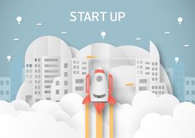 Vector illustration with start up concept in paper cut, craft and origami style. Rocket on the sky.