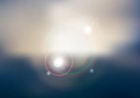 Abstract sunset or sunrise sky and sun shining blurred background with flare. vector