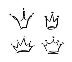Conjunto de símbolo dibujado a mano de una corona estilizada. Dibujado con tinta negra y pincel. Ilustración del vector aislada en blanco. Diseño de logo. Pincelada de grunge