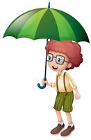 Niño pequeño y paraguas verde vector
