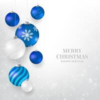 Christmas background with blue and white Christmas baubles. Elegant Christmas background with blue and light evening balls