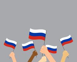 Vector illustration of hands holding Russia flags isolated on gray background 