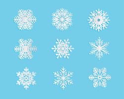 Set of Snow flakes in paper cut style on blue background. Vector illustration.