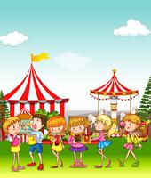 Children having fun at the amusement park vector