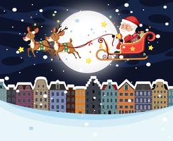 Santa riding sleigh over town