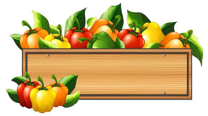 Bell peppers and wooden board