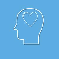 Human head with heart icon ,love symbol cut from white paper