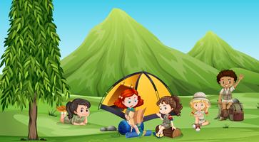 Children camping out in the woods vector