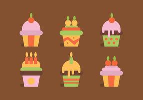Colorido conjunto de cupcakes vector