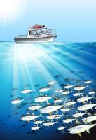 Fishing boat and fish under the sea vector