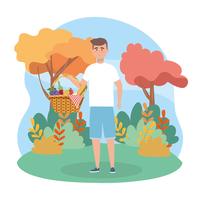 Man with picnic basket in park  vector