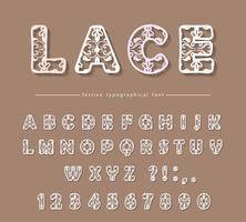 Paper cut out lacy filigree decorative font