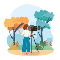 Camerawoman recording video in urban park  vector