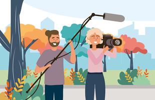 Camerawoman and man with microphone outside vector