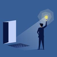 Businessman holding idea to light the way find trap in front of the door vector