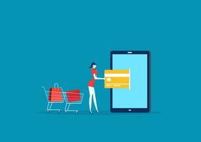 Lady shopping and paying with credit card via mobile vector