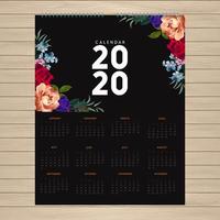 Diseño de calendario 2020 con flores en las esquinas vector