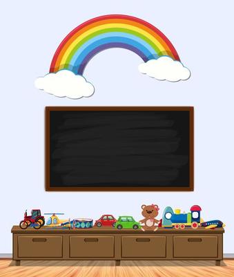 Chalkboard with toys and rainbow