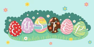 Decorative Easter eggs on green grass