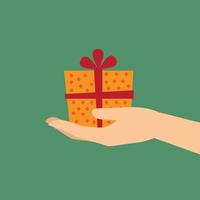 Hand holding a gift vector