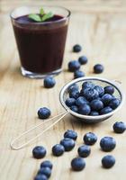 Fresh blueberries and smoothie photo