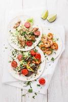 Tortillas with beef, chicken and shrimps