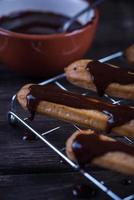 Fresh churros with chocolate dip photo