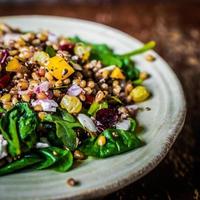 Healthy salad with spinach,quinoa and roasted vegetables photo