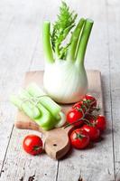 fresh organic fennel, celery and tomatoes photo