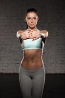 Beautiful sports girl do workout, abs, abdominals, training photo