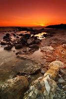 Rocky seascape sunset photo