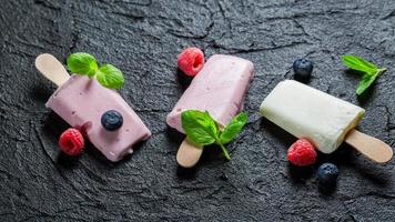 Yummy ice cream with berry fruits photo