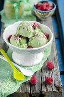 Matcha ice cream with raspberries