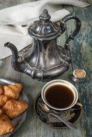 Coffee and croissants photo