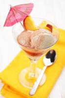 Creme Brulee ice cream with drink umbrella photo