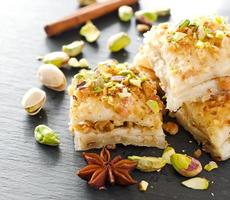Turkish pistachio pastry dessert  baklava with green pistachios photo