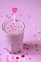 Pink milkshake with hearts photo