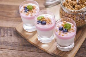 Delicious dessert, flakes flooded in two flavors yogurt