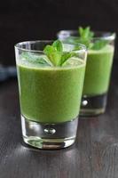 fresh homemade smoothie with spinach and bananas photo