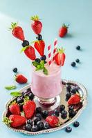 Fresh healthy strawberry and blueberry smoothie, milk shake, sum photo