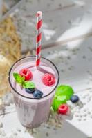 Yummy smoothie with berry fruits photo